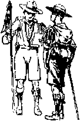 Dos scouts conversan; uno de ellos lleva el banderín de patrulla